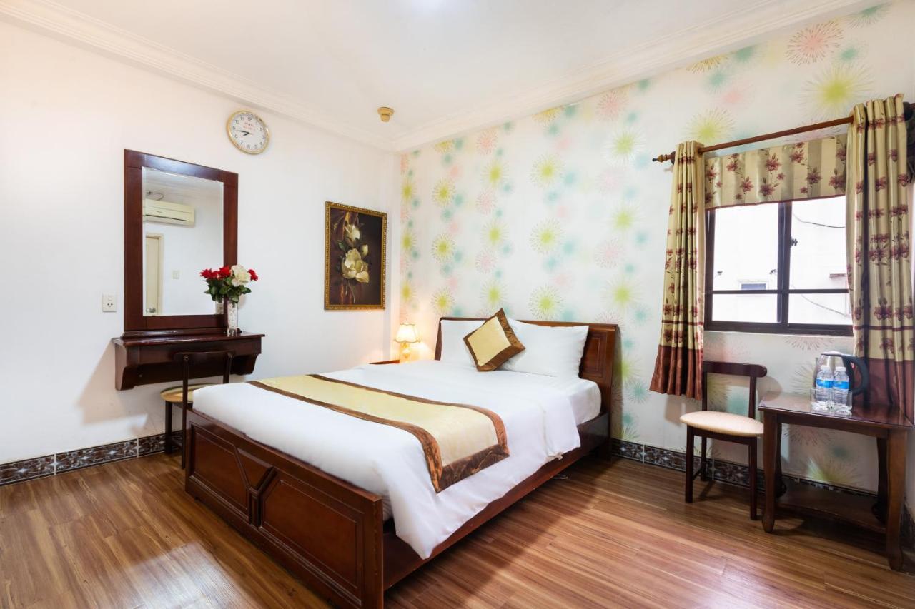 Cosmo Central Hotel Ho Chi Minh Exterior photo